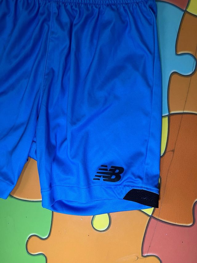 Pantalones cortos New Balance azules