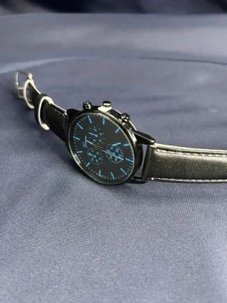 Orologio al quarzo con cinturino in similpelle