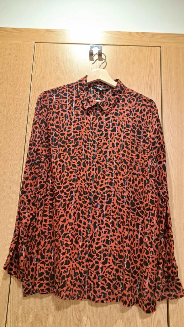 Blusa leopardo rayas plateadas