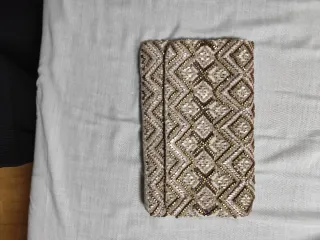 Bolso de fiesta beige y dorado