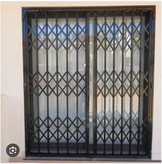 Reja extensible negra 2 hojas 424x272