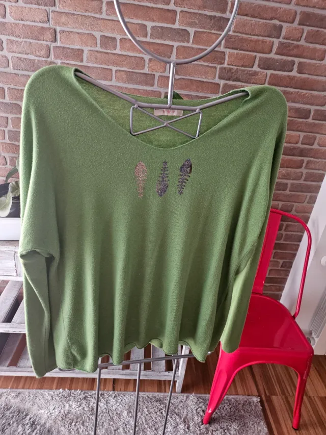 Jersey verde con peces