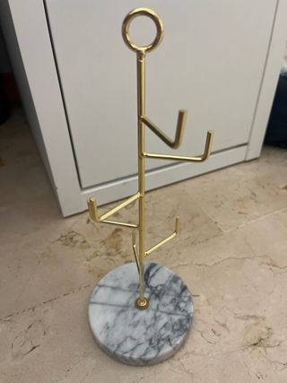 Joyero dorado con base de mármol