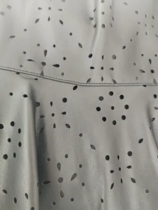 Falda polipiel niña T9/10 de Mango