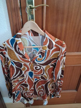 Blusa estampada manga larga