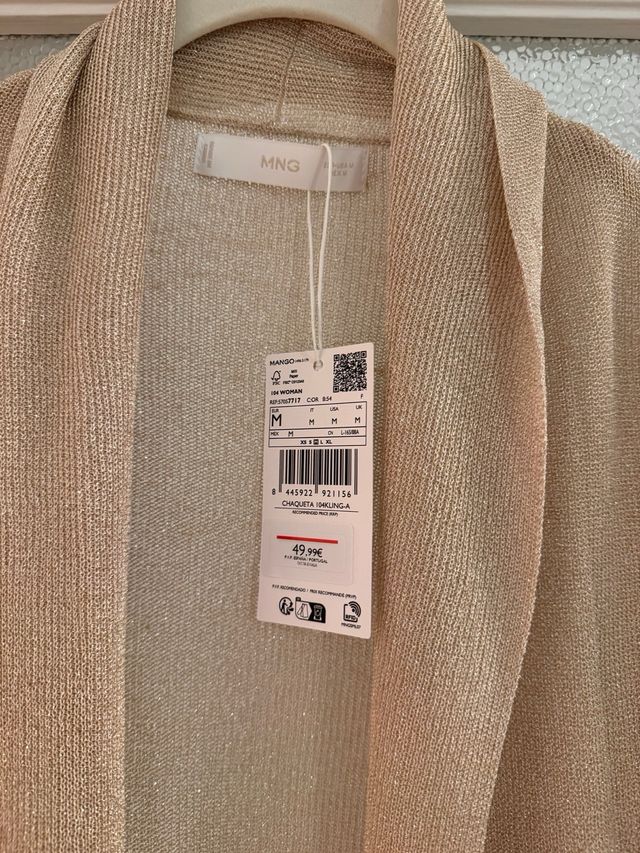 Chaqueta punto Mango dorada.