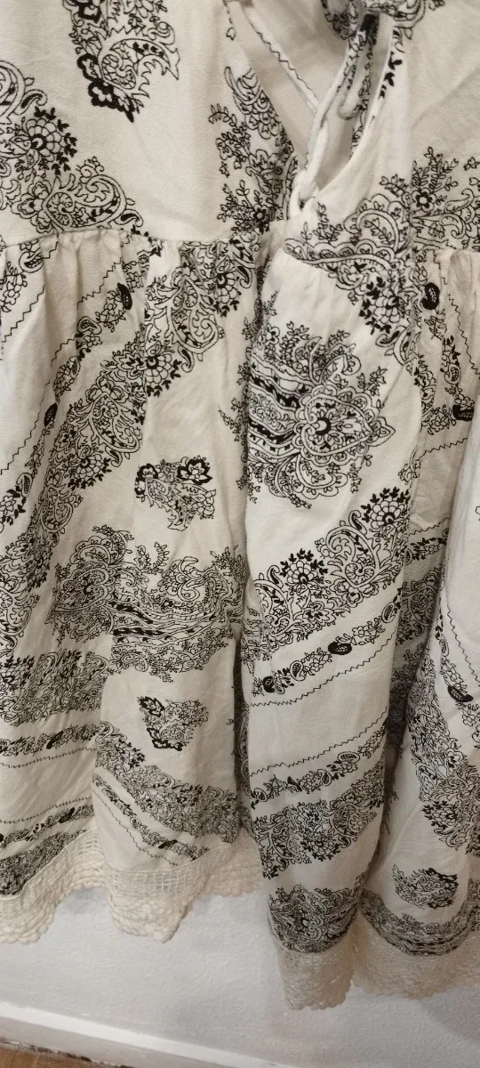 Vestido blanco bohemio con encaje