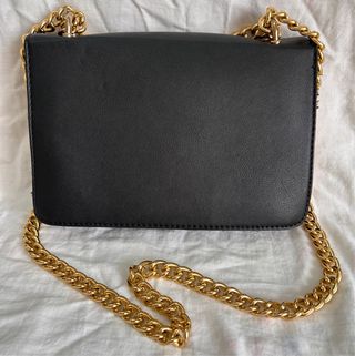 Borsa Stradivarius nera con decorazioni floreali