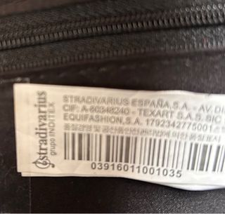 Borsa Stradivarius nera con decorazioni floreali