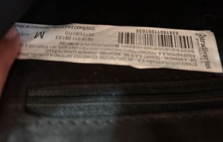 Borsa Stradivarius nera con decorazioni floreali