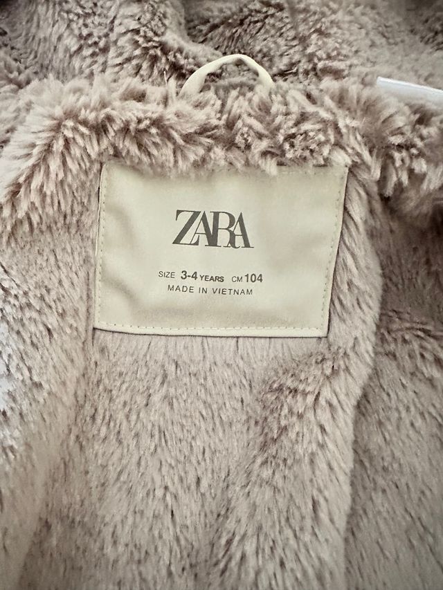 Abrigo niña beige con capucha