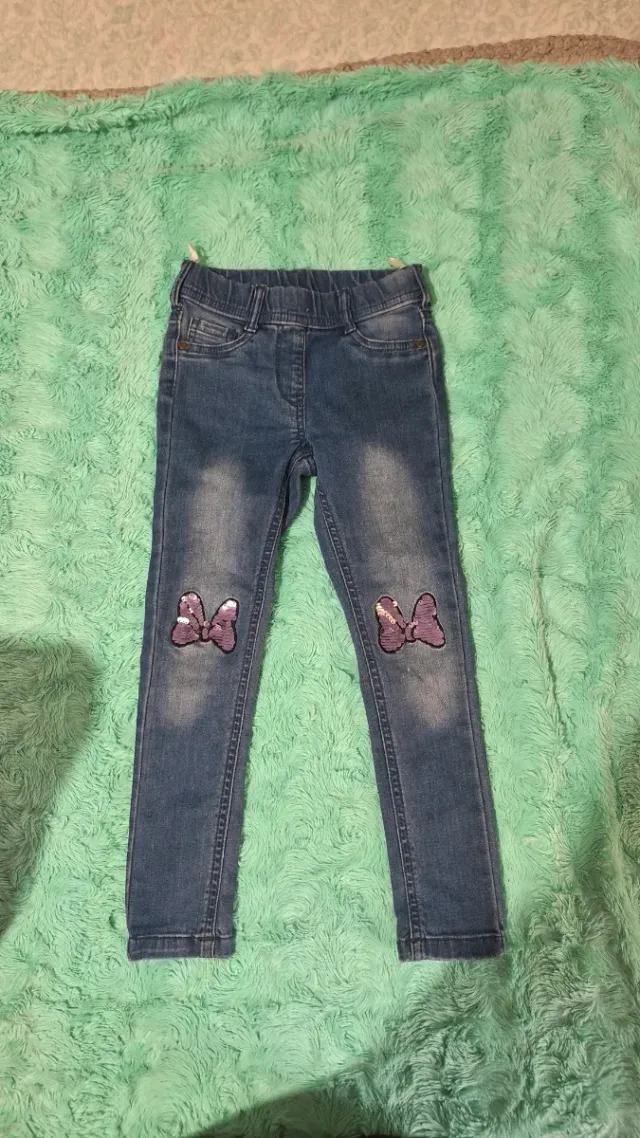 Pantalón vaquero niña con lazos lentejuelas
