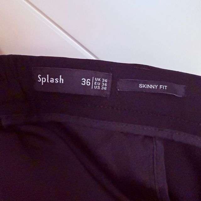 Pantalones de vestir negros con cremallera