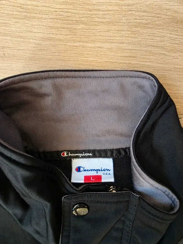 Chaqueta Champion Retro Negra Naranja