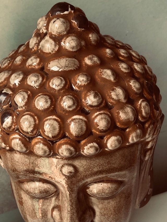 Testa di Buddha in ceramica