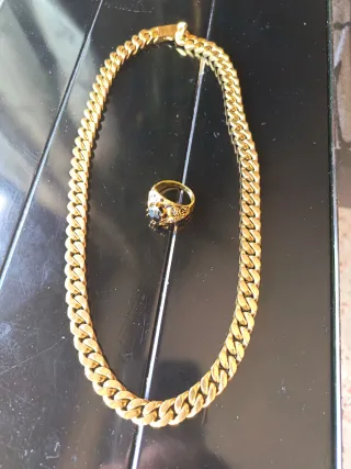 Cadena ancha y anillo dorado