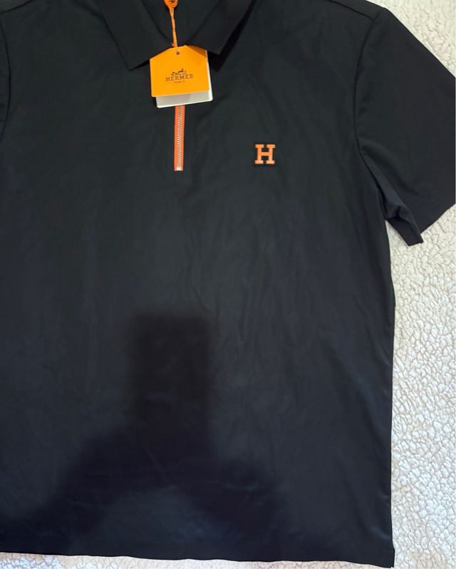 Polo Hermes Nero con Zip Arancione