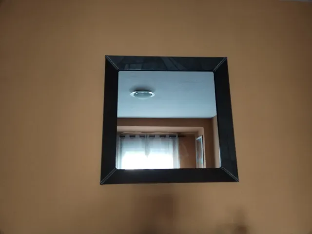 Espejo de pared marcó imitación piel