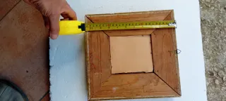 Antica cornice dorata con decorazioni