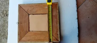 Antica cornice dorata con decorazioni