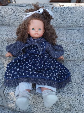 Muñeca antigua, solo ha estado de exposición.