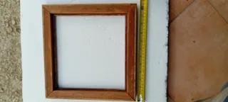 Cornice antica in legno intagliato