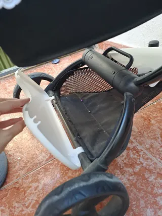 Carrito de muñecas con capazo y bolso