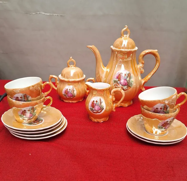 Juego de café porcelana dorado y naranja