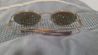 Gafas de sol Miu Miu doradas y marrones