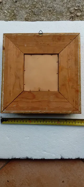 Antica cornice dorata con vetro