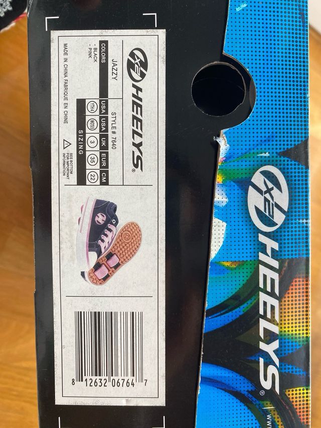 Zapatillas con ruedas Heelys negras y rosas