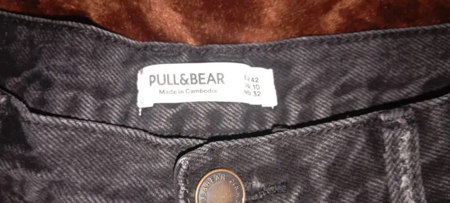 Tejanos negros cortos rotos