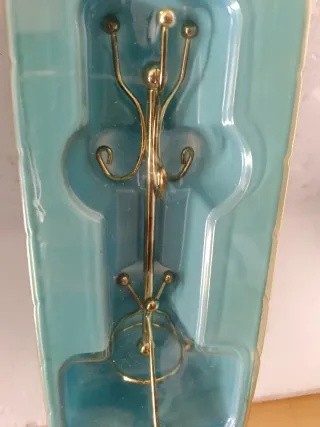 Miniatura appendiabiti casa bambole oro