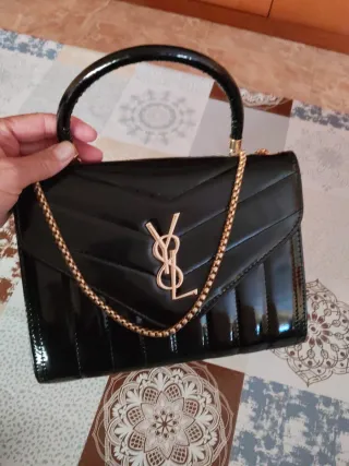 Bolso YSL negro cadena dorada