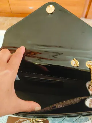 Bolso YSL negro cadena dorada