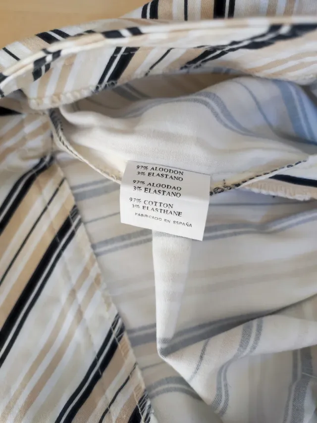 Pantalón de vestir a rayas beige y negro