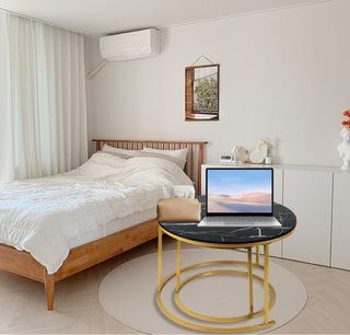 Set di 2 tavoli rotondi in marmo nero/oro