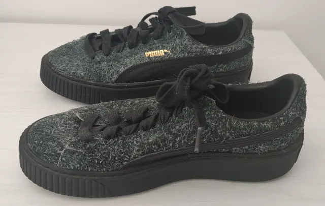 Zapatillas Puma grises y negras