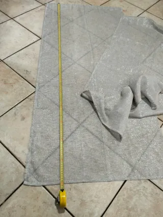 Tende grigie/argento con fili luminosi