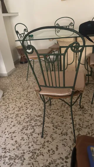 Mesa cristal pedestal piedra y 6 sillas de forja