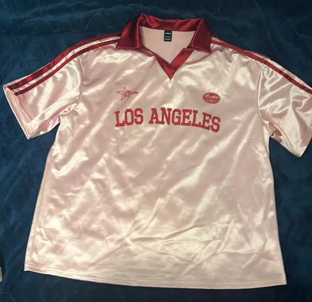 Camiseta rosa Los Angeles con detalles rojos