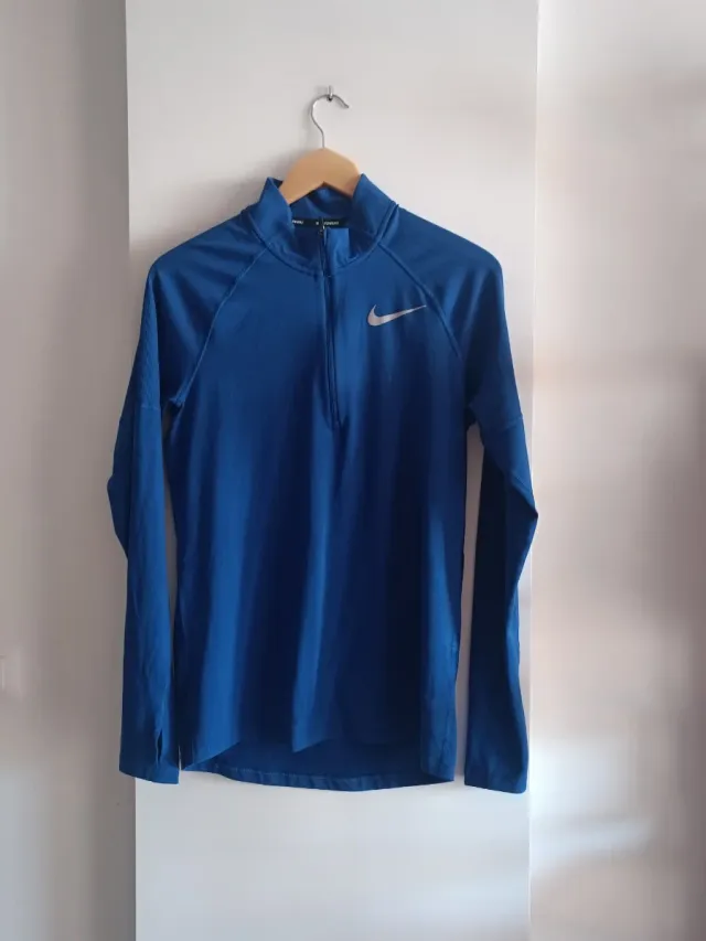 Camiseta deportiva Nike azul media cremallera