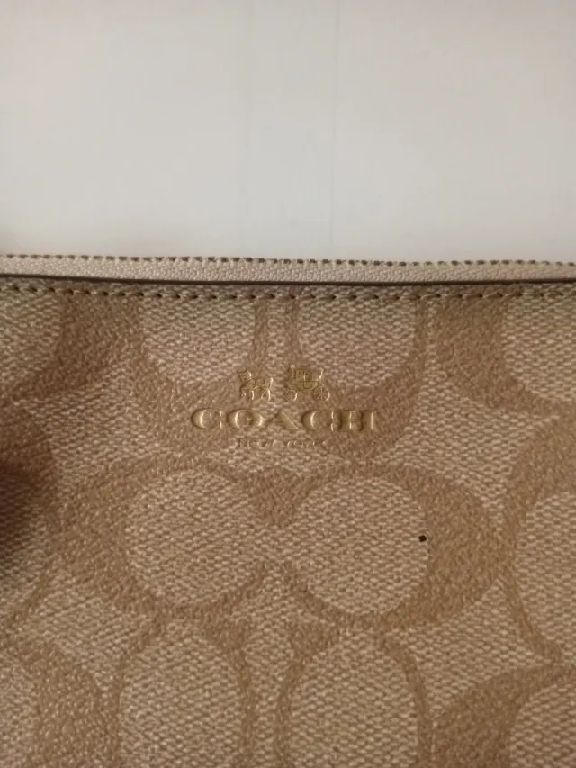 Cartera de mano Coach beige