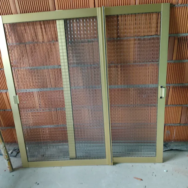 Ventanas aluminio dorado correderas