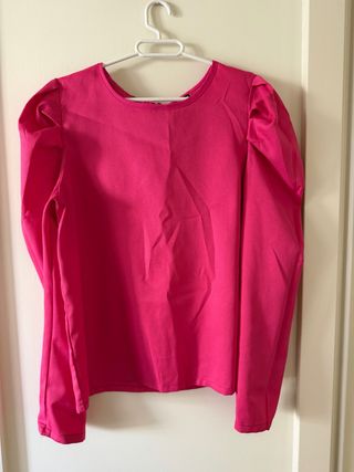 Blusa fucsia manga abullonada