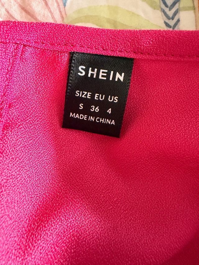 Blusa fucsia manga abullonada