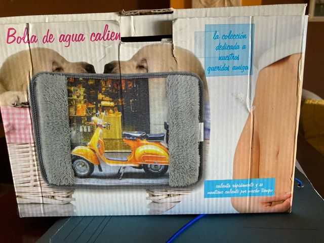 Bolsa de agua caliente eléctrica con funda