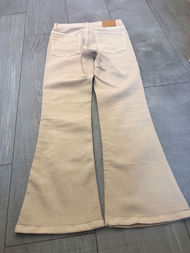 Pantalones campana beige