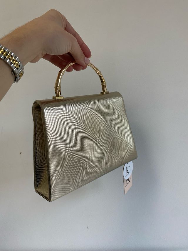Bolso de mano dorado Karho & co fiesta
