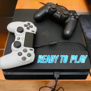 PS4 Slim 500GB + 2 Mandos + 7 Giochi